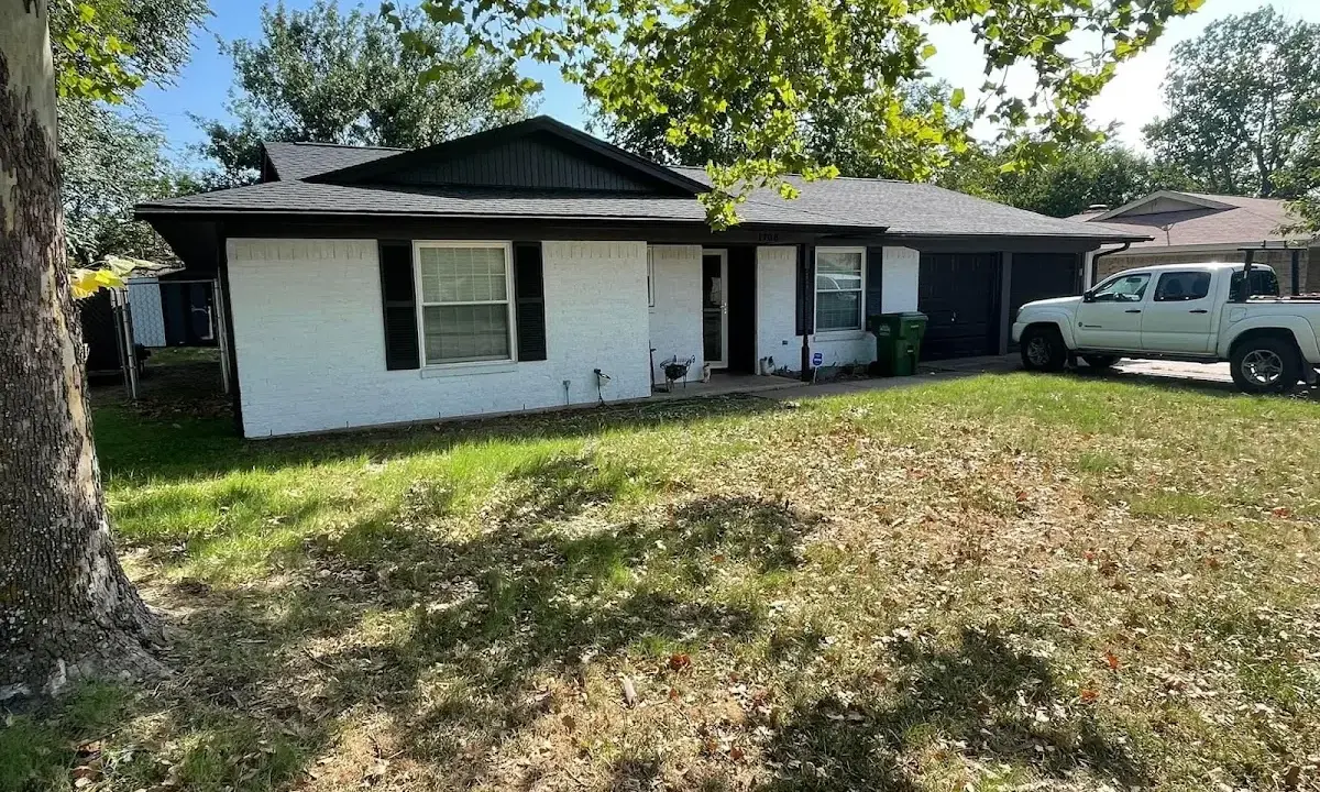 Professional roofing crew working on a residential roof in Hillsboro